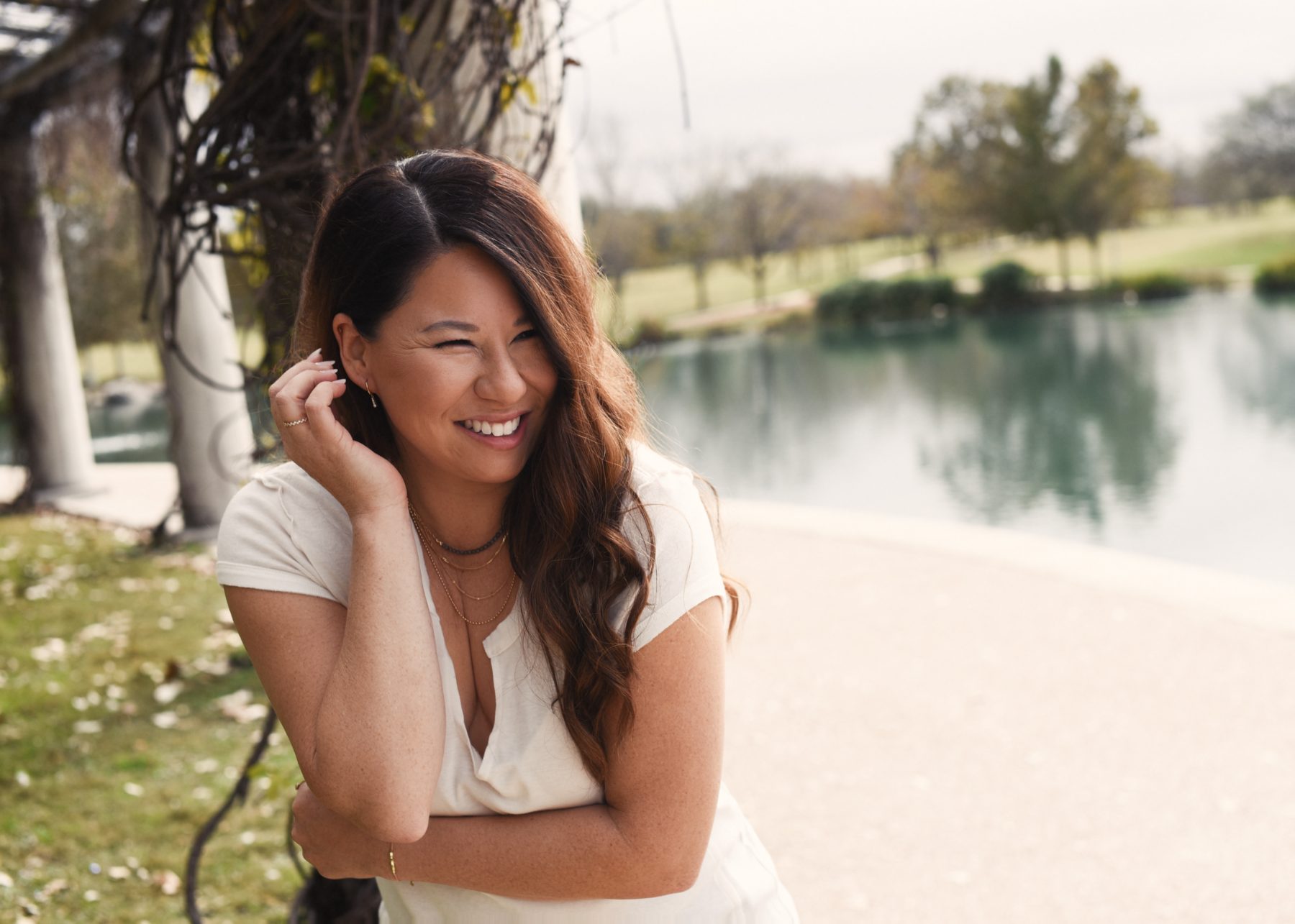 Desiree sitting by the water