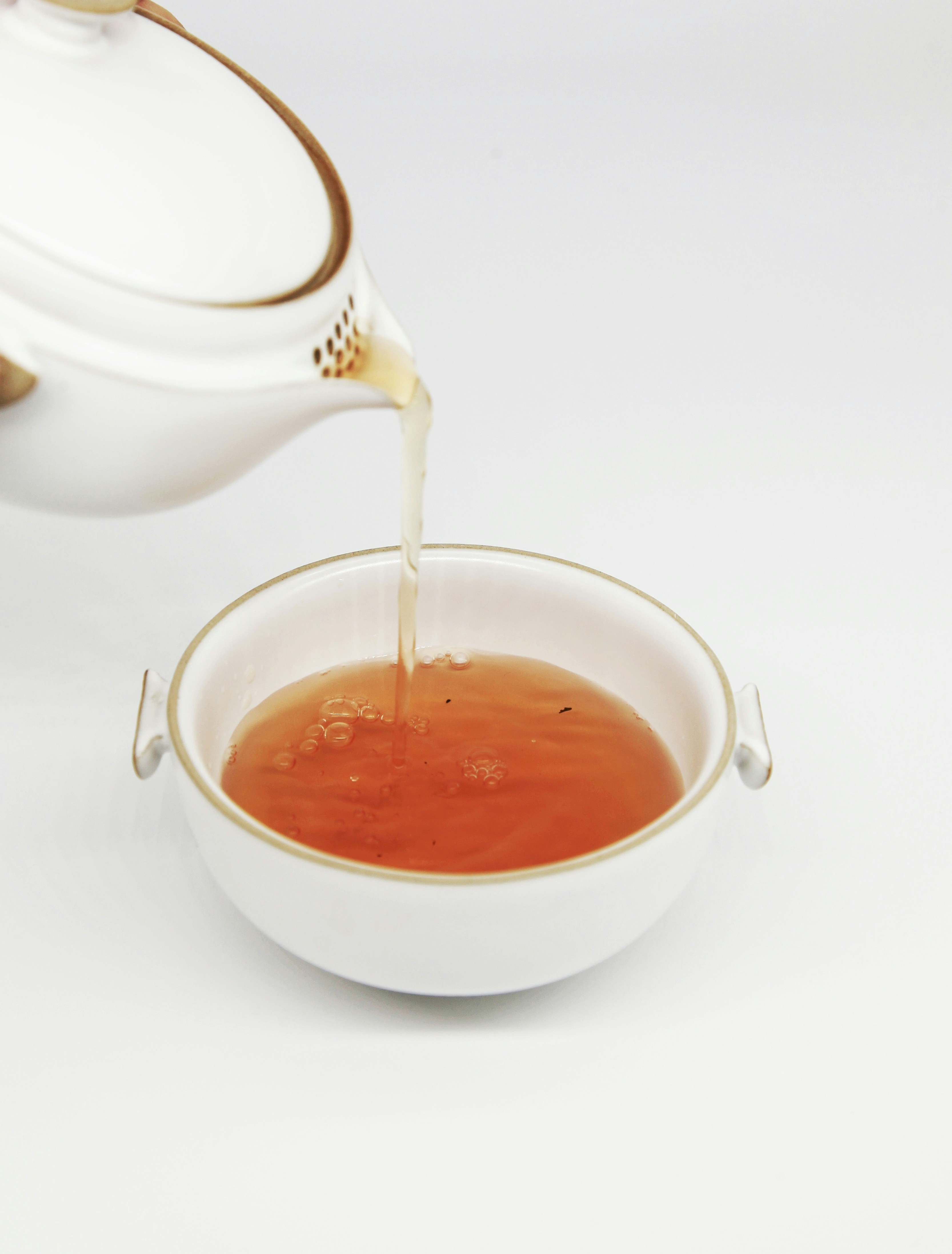 Summer tea being poured